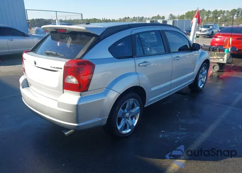 2010 Dodge Caliber Rush z USA, uszkodzony, nr VIN 1B3CB8HB9AD648282